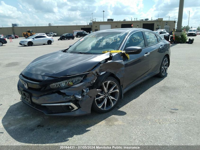 2019 Honda Civic Touring VIN: 2HGFC1F94KH104424 Lot: 20164431