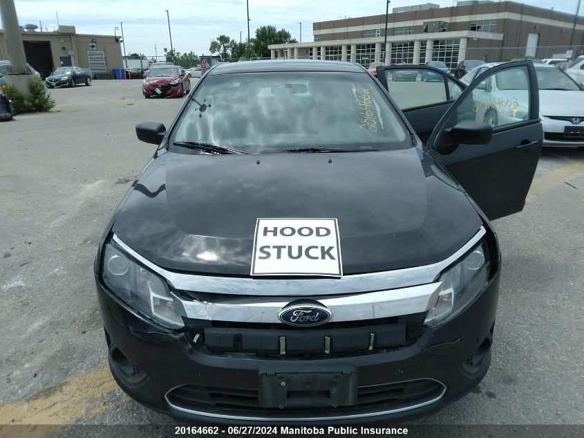 2011 Ford Fusion S VIN: 3FAHP0GA5BR162700 Lot: 20164662