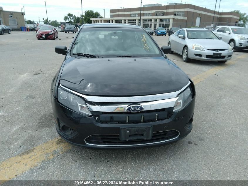 2011 Ford Fusion S VIN: 3FAHP0GA5BR162700 Lot: 20164662