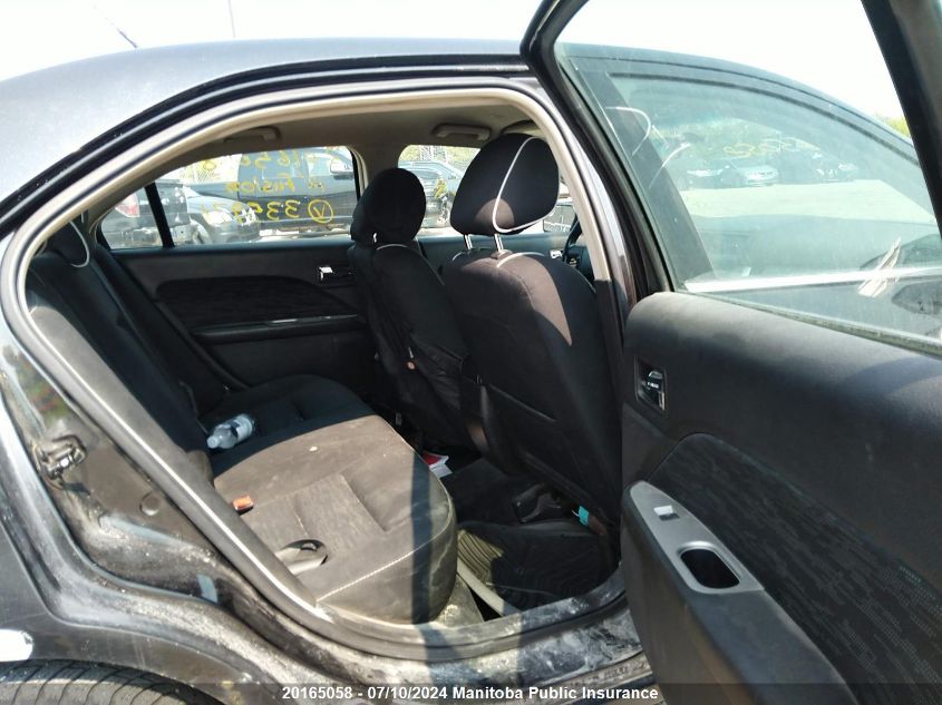 2012 Ford Fusion S VIN: 3FAHP0HA3CR335971 Lot: 20165058