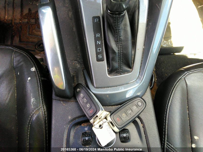 2013 Ford Focus Titanium VIN: 1FADP3J21DL327810 Lot: 20165368