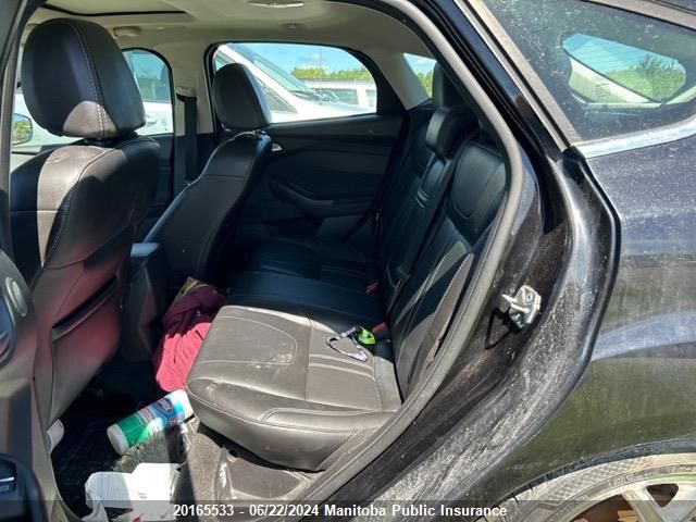 2013 Ford Focus Titanium VIN: 1FADP3N20DL309972 Lot: 20165533