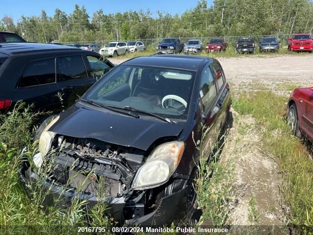 2009 Toyota Yaris Le VIN: JTDKT923795260486 Lot: 20167795