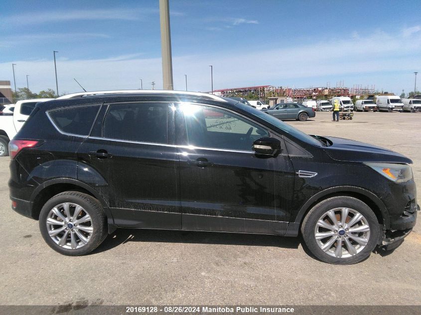 2017 Ford Escape Titanium VIN: 1FMCU9J90HUD31602 Lot: 20169128