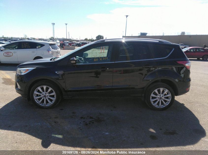2017 Ford Escape Titanium VIN: 1FMCU9J90HUD31602 Lot: 20169128