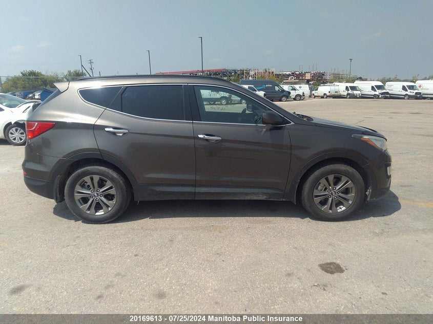 2014 Hyundai Santa Fe Sport 2.0T VIN: 5XYZUDLA9EG211013 Lot: 20169613
