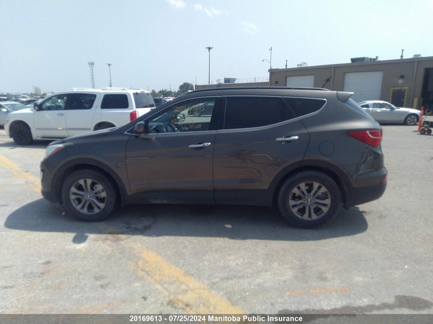 2014 Hyundai Santa Fe Sport 2.0T VIN: 5XYZUDLA9EG211013 Lot: 20169613