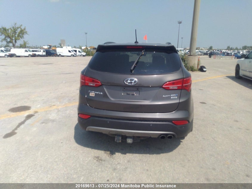 2014 Hyundai Santa Fe Sport 2.0T VIN: 5XYZUDLA9EG211013 Lot: 20169613