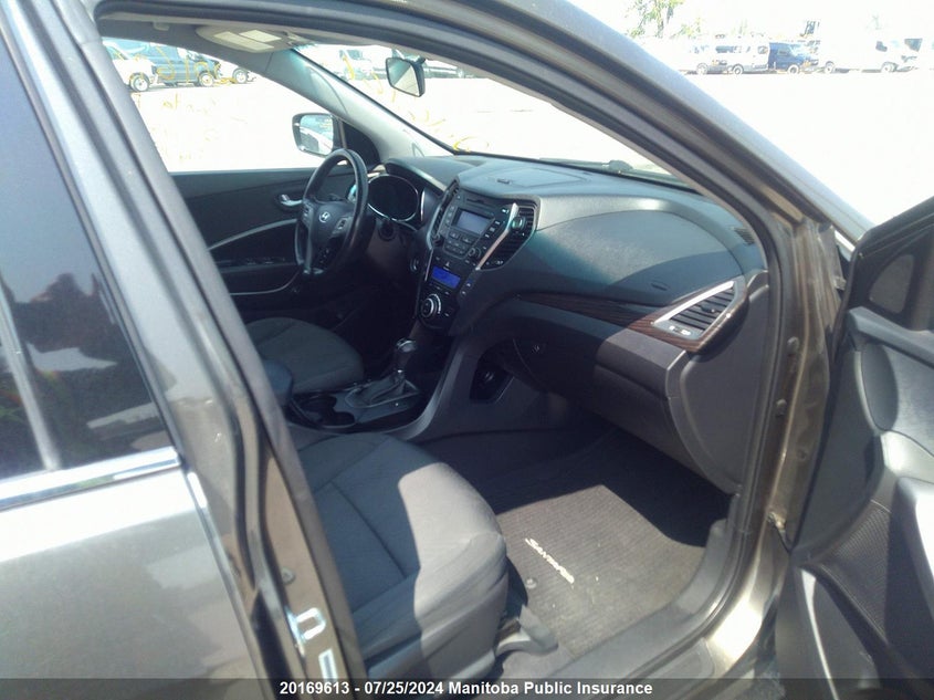 2014 Hyundai Santa Fe Sport 2.0T VIN: 5XYZUDLA9EG211013 Lot: 20169613