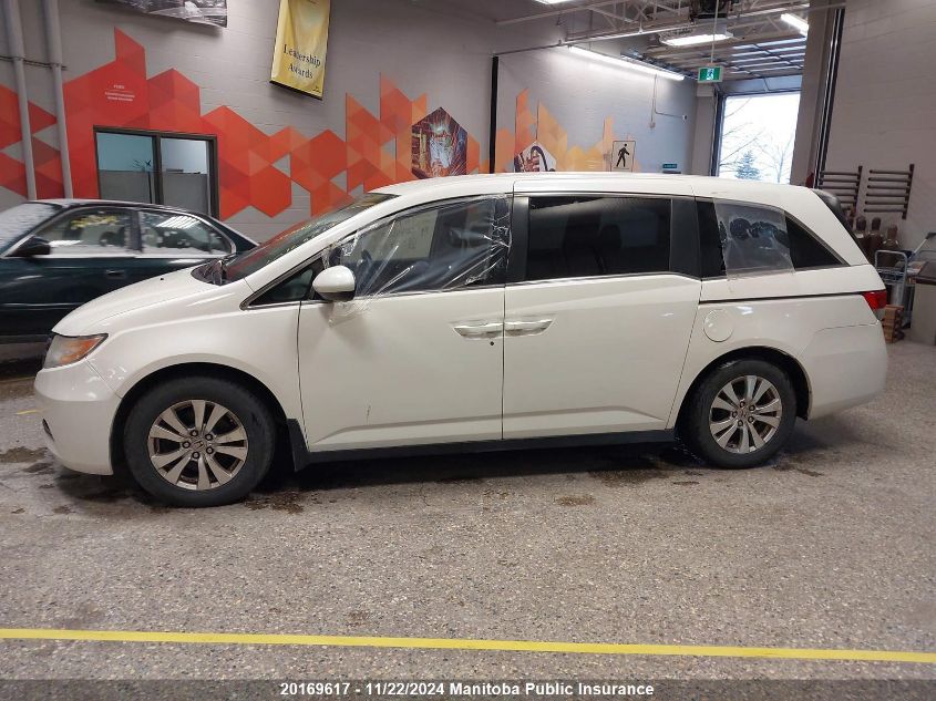 2014 Honda Odyssey Se VIN: 5FNRL5H32EB504892 Lot: 20169617