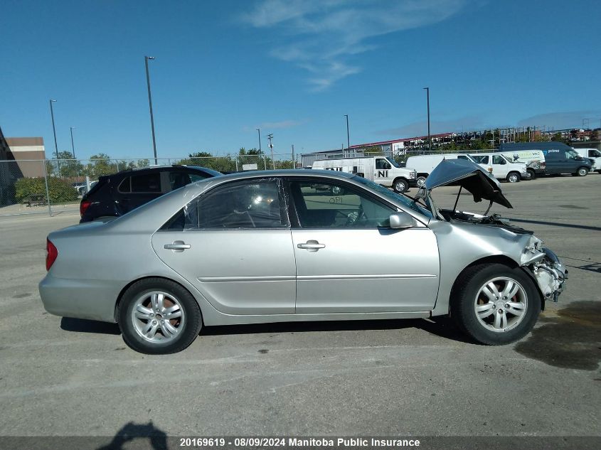 2003 Toyota Camry Le VIN: JTDBE32K130193323 Lot: 20169619