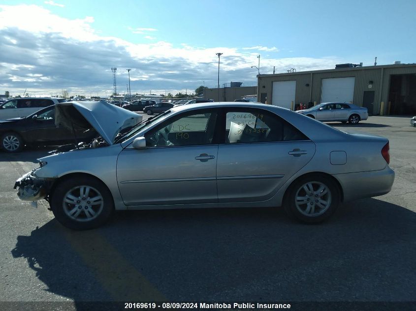 2003 Toyota Camry Le VIN: JTDBE32K130193323 Lot: 20169619