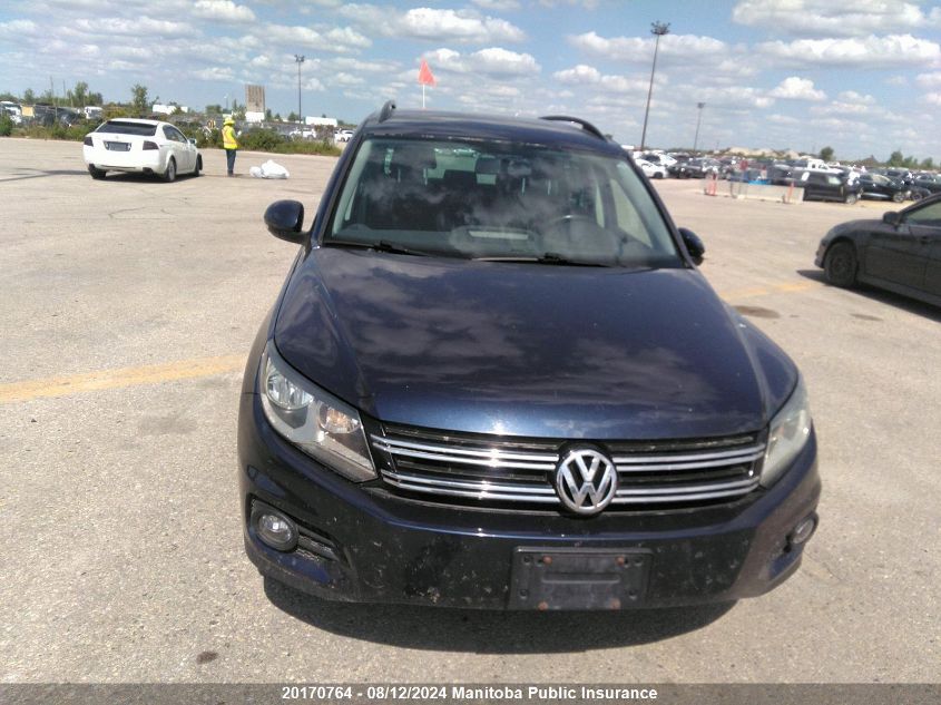 2014 Volkswagen Tiguan 2.0 Tsi VIN: WVGJV3AX1EW587313 Lot: 20170764