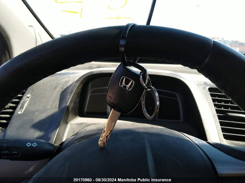 2009 Honda Civic Ex-L VIN: 2HGFG11079H003935 Lot: 20170960