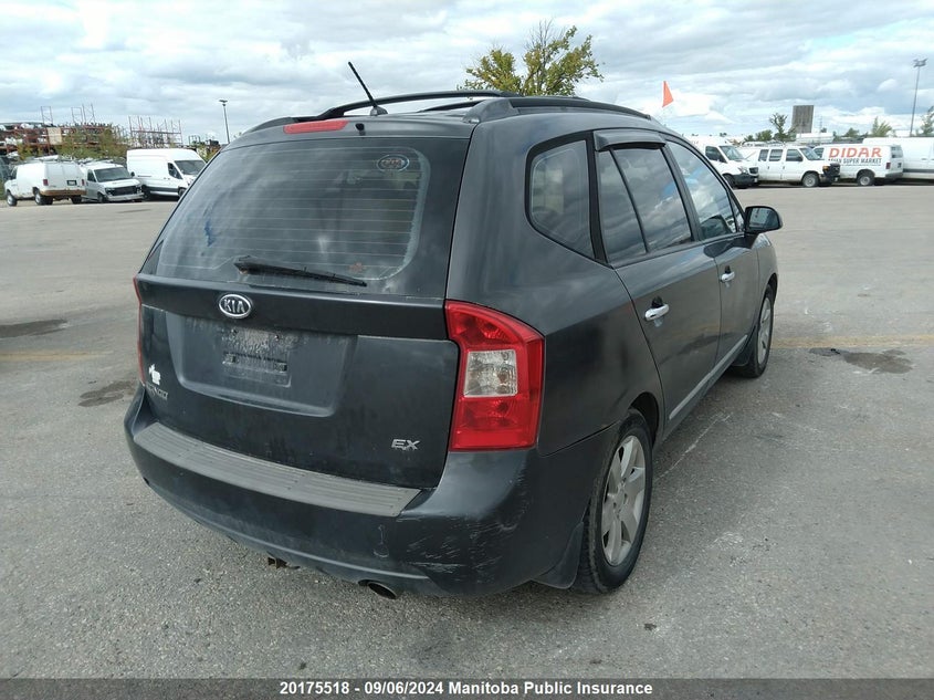 2007 Kia Rondo VIN: KNAFG525277107058 Lot: 20175518