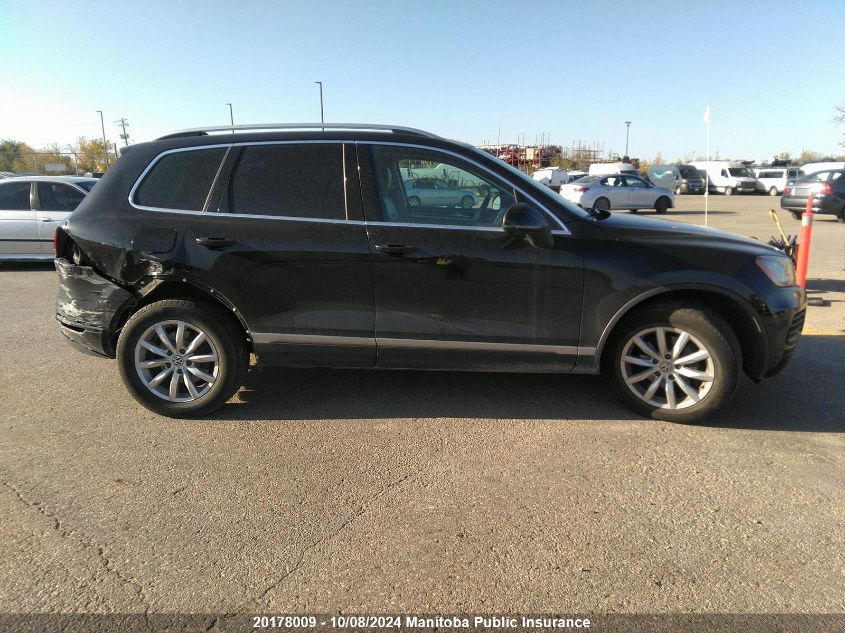 2013 Volkswagen Touareg V6 VIN: WVGDF9BP5DD000200 Lot: 20178009