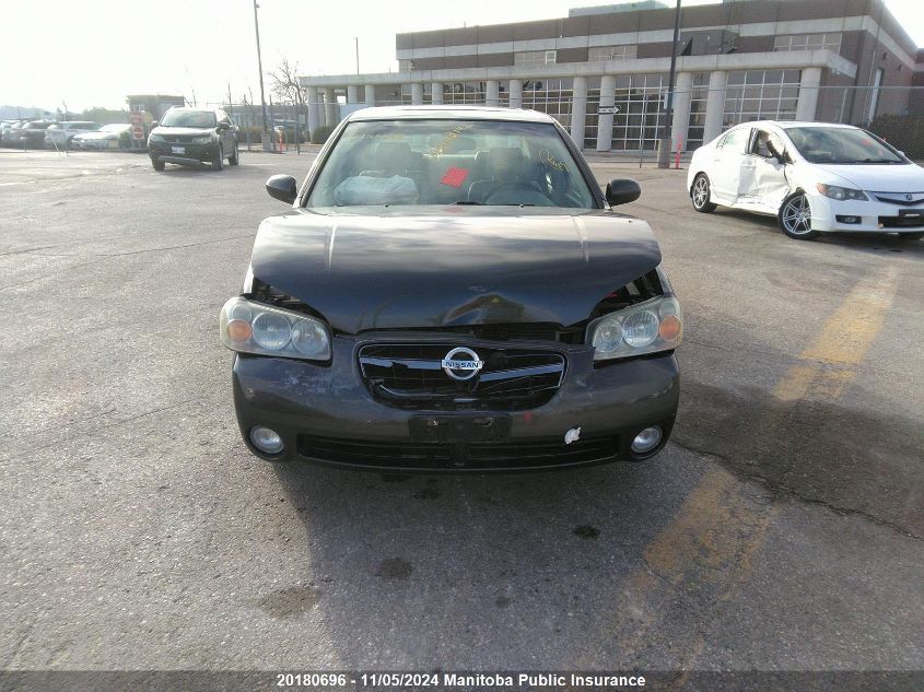 2003 Nissan Maxima Gle VIN: JN1DA31A93T437556 Lot: 20180696