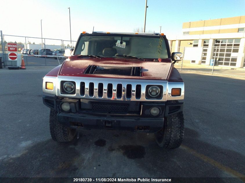 2003 Hummer H2 VIN: 5GRGN23U73H112244 Lot: 20180739