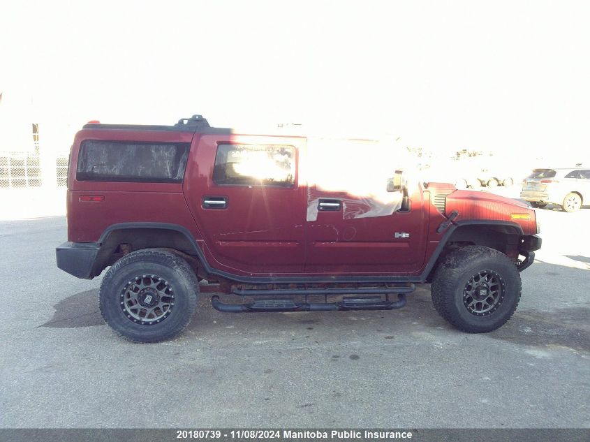 2003 Hummer H2 VIN: 5GRGN23U73H112244 Lot: 20180739