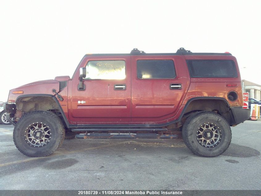 2003 Hummer H2 VIN: 5GRGN23U73H112244 Lot: 20180739