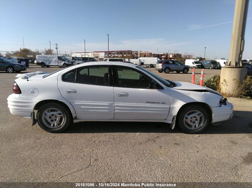 1999 Pontiac Grand Am Se VIN: 1G2NE52T0XC540313 Lot: 20181096