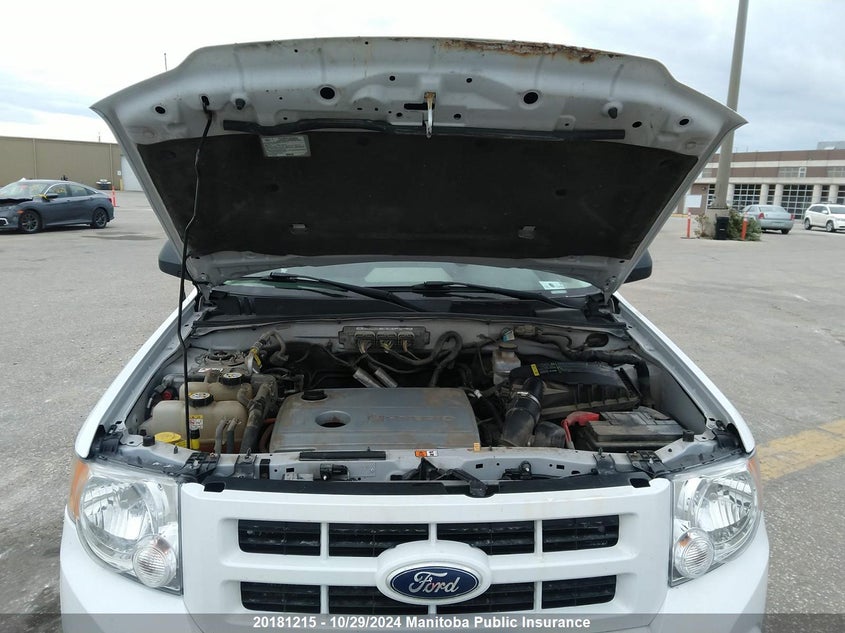 2010 Ford Escape Hybrid VIN: 1FMCU4K35AKB26484 Lot: 20181215