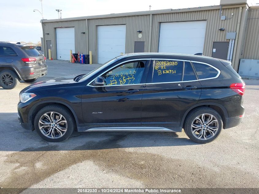 2018 BMW X1 28I VIN: WBXHT3C38J5K30751 Lot: 20182030