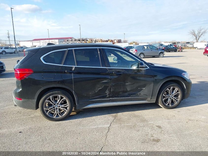 2018 BMW X1 28I VIN: WBXHT3C38J5K30751 Lot: 20182030