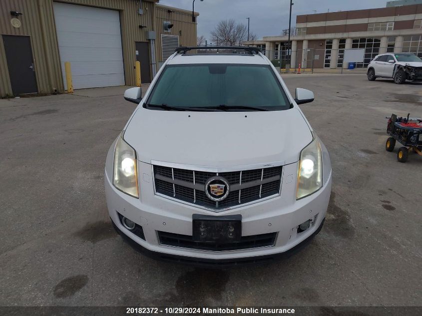 2011 Cadillac Srx V6 VIN: 3GYFNEE69BS580800 Lot: 20182372