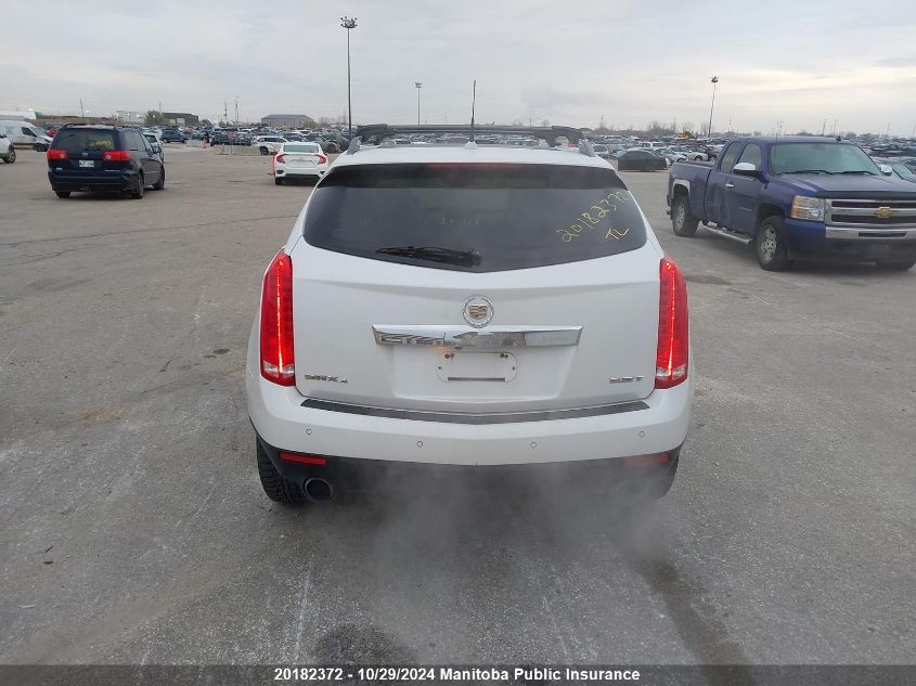 2011 Cadillac Srx V6 VIN: 3GYFNEE69BS580800 Lot: 20182372