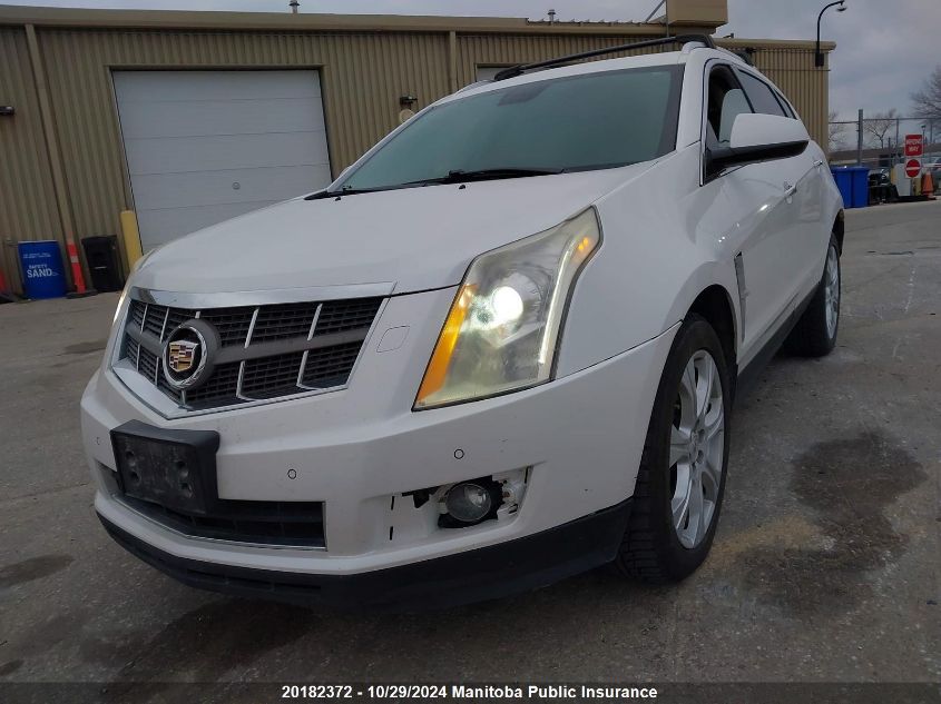 2011 Cadillac Srx V6 VIN: 3GYFNEE69BS580800 Lot: 20182372