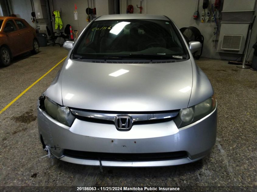 2006 Honda Civic Lx VIN: 2HGFA165X6H001856 Lot: 20186063