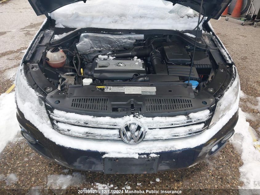 2014 Volkswagen Tiguan 2.0 Tsi VIN: WVGJV3AX1EW587313 Lot: 20189525