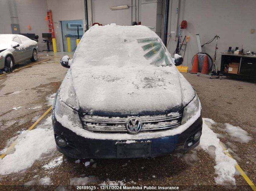 2014 Volkswagen Tiguan 2.0 Tsi VIN: WVGJV3AX1EW587313 Lot: 20189525