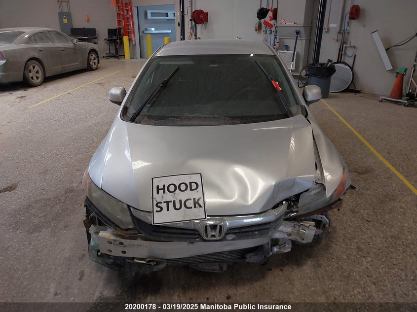 2012 Honda Civic Lx VIN: 2HGFB2F41CH104654 Lot: 20200178