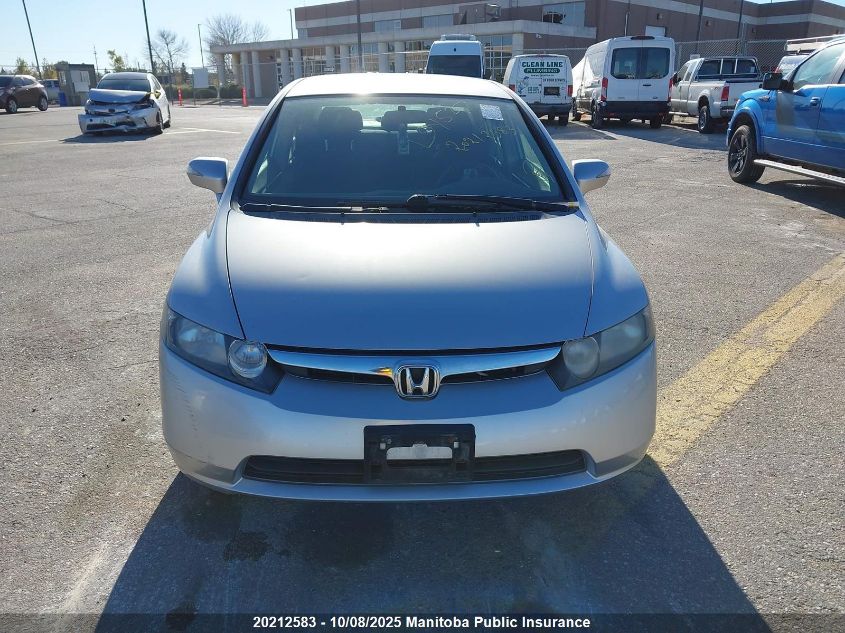 2007 Honda Civic Hybrid VIN: JHMFA362X7S801985 Lot: 20212583