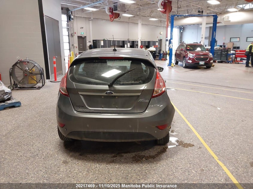 2014 Ford Fiesta Titanium VIN: 3FADP4FJ0EM105605 Lot: 20217469