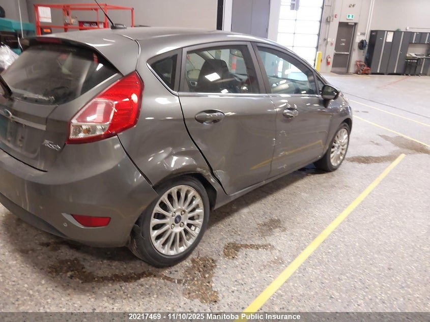 2014 Ford Fiesta Titanium VIN: 3FADP4FJ0EM105605 Lot: 20217469