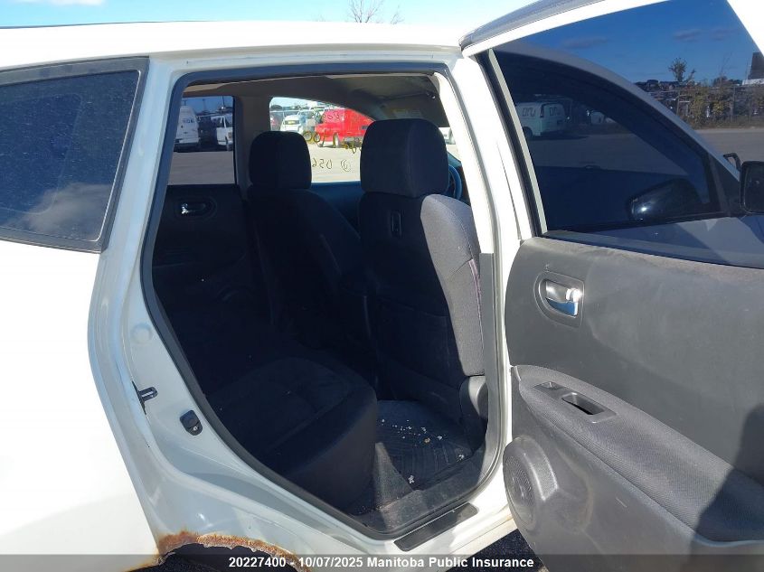 2009 Nissan Rogue S VIN: JN8AS58T19W056411 Lot: 20227400