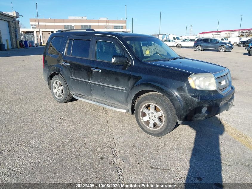 2011 Honda Pilot Touring VIN: 5FNYF4H98BB015975 Lot: 20227405