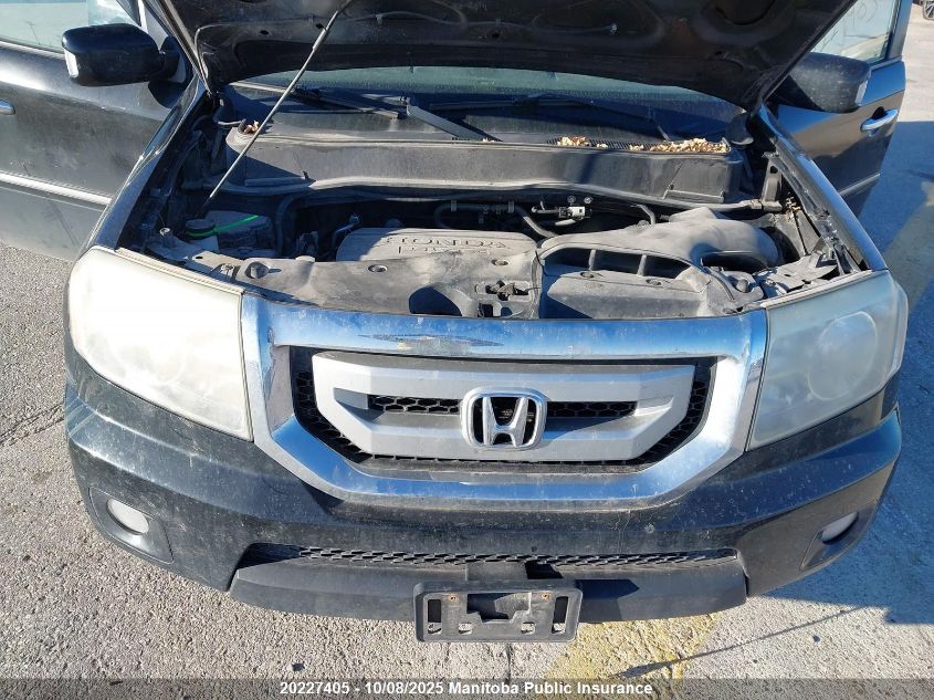 2011 Honda Pilot Touring VIN: 5FNYF4H98BB015975 Lot: 20227405