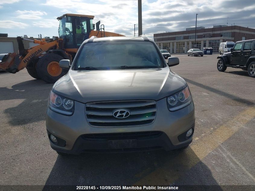 2012 Hyundai Santa Fe Gl Sport VIN: 5XYZGDAG8CG143623 Lot: 20228145