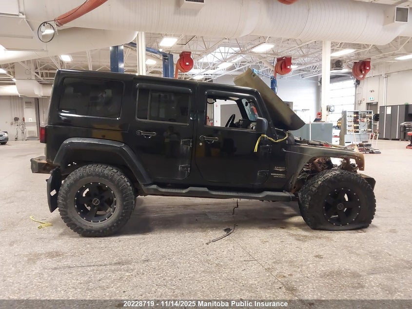 2009 Jeep Wrangler Unlimited Sahara VIN: 1J4GA59139L767139 Lot: 20228719