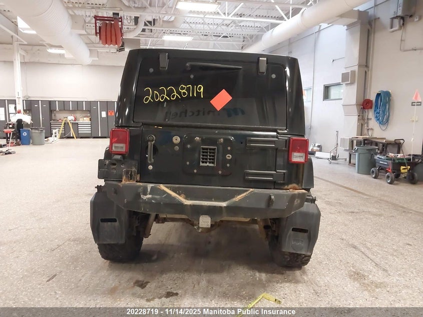 2009 Jeep Wrangler Unlimited Sahara VIN: 1J4GA59139L767139 Lot: 20228719