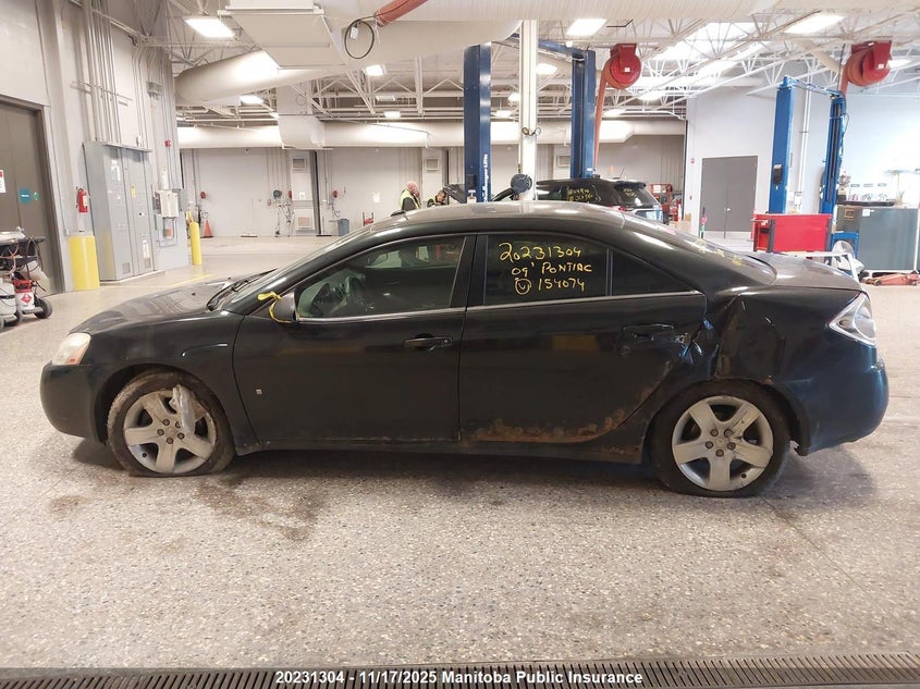 2009 Pontiac G6 VIN: 1G2ZG57B594154074 Lot: 20231304