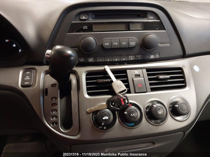 2007 Honda Odyssey Lx VIN: 5FNRL38297B502779 Lot: 20231519