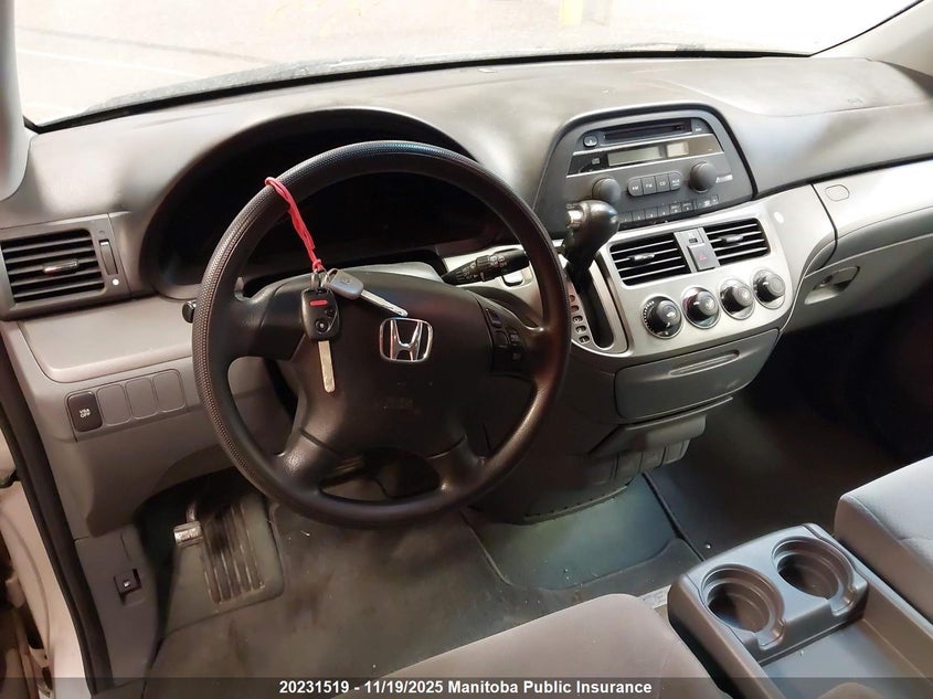 2007 Honda Odyssey Lx VIN: 5FNRL38297B502779 Lot: 20231519