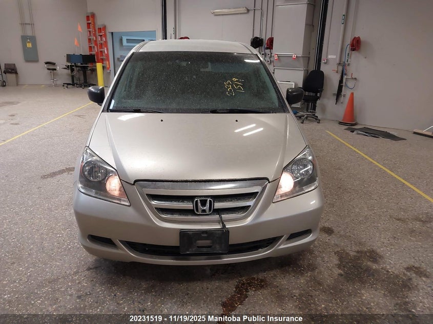 2007 Honda Odyssey Lx VIN: 5FNRL38297B502779 Lot: 20231519