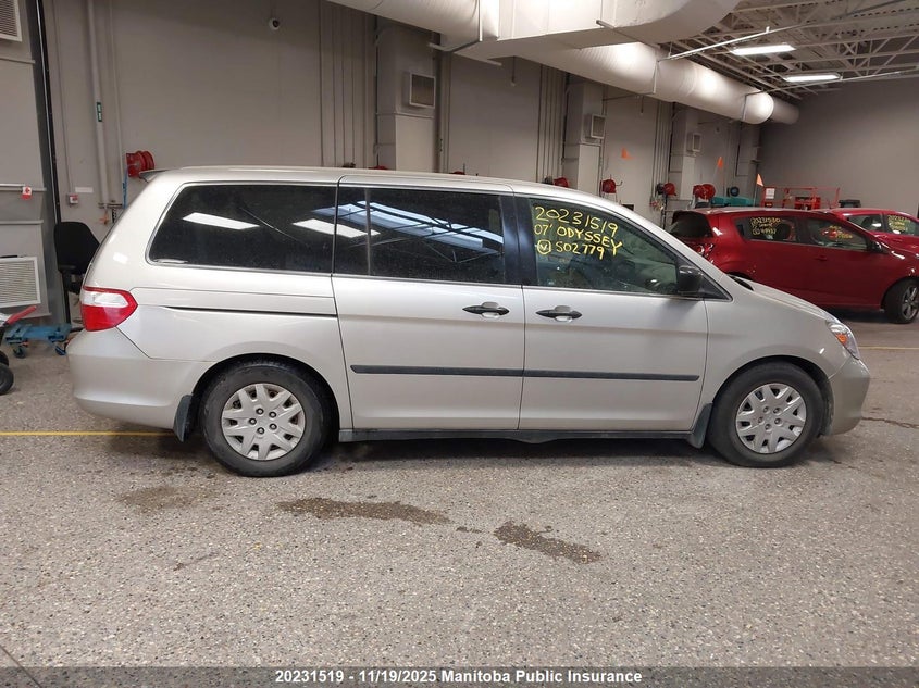 2007 Honda Odyssey Lx VIN: 5FNRL38297B502779 Lot: 20231519