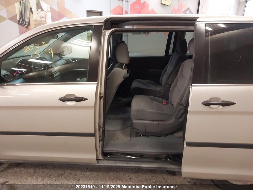 2007 Honda Odyssey Lx VIN: 5FNRL38297B502779 Lot: 20231519